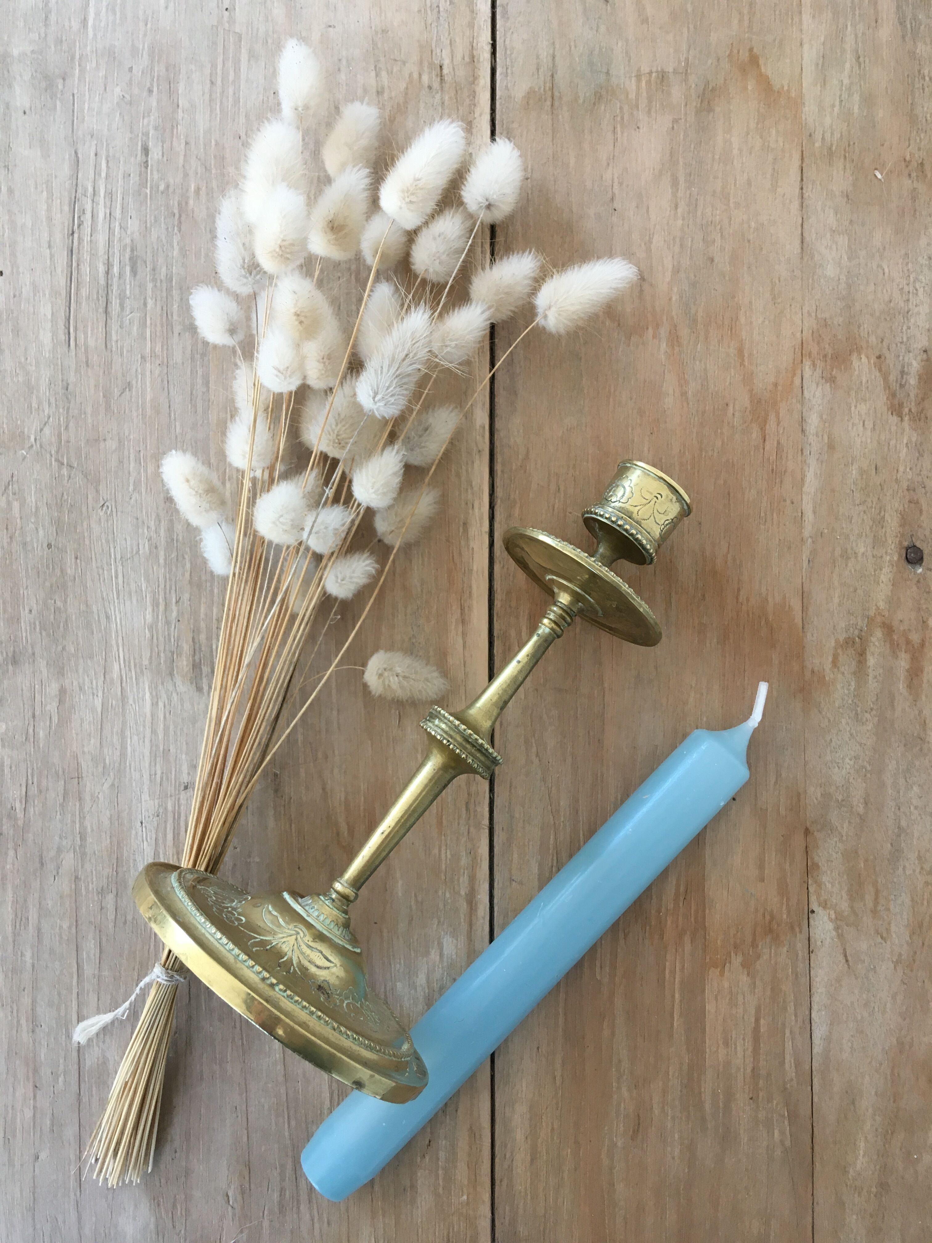 Chiseled brass candle holder