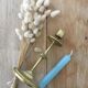 Chiseled brass candle holder