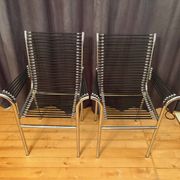 Pair of "Sandows" chairs designed by Rene Herbst, Bauhaus, France, 1980s