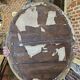 Old black and gold patinated oval mirror louis xv style