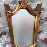 Art Deco mirror in carved wood with gilding, 1950