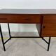 French modernist desk from the 1950s with 2 drawers, 1 cabinet, and 1 container.