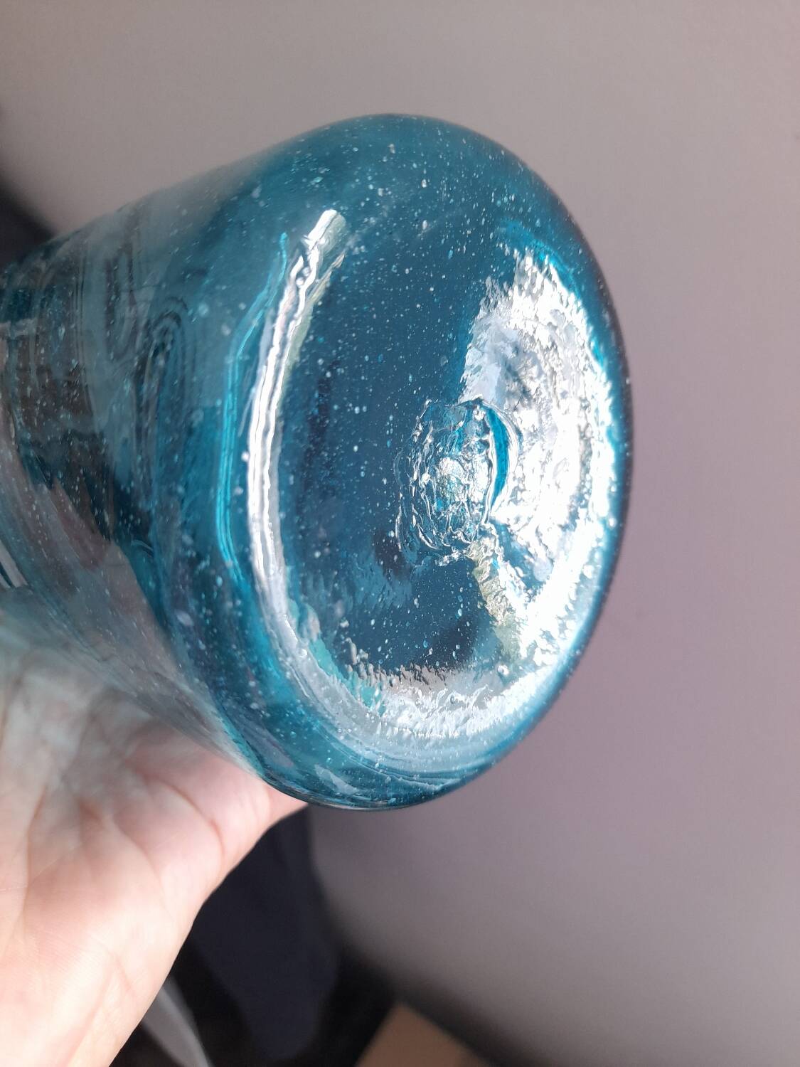 Tall twisted blue glass carafe