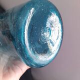 Tall twisted blue glass carafe