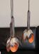 Massive Belgique three-armed waterfall pendant lamp in chrome and orange lacquer