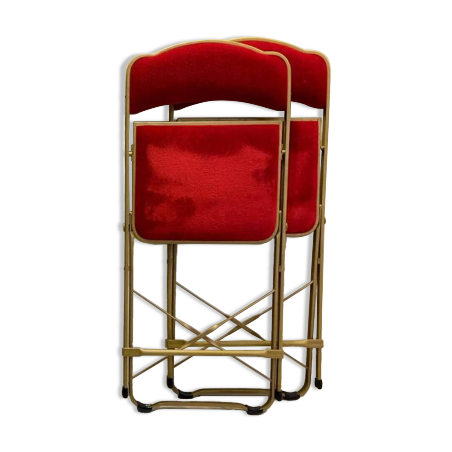 2 metal and red velvet chairs