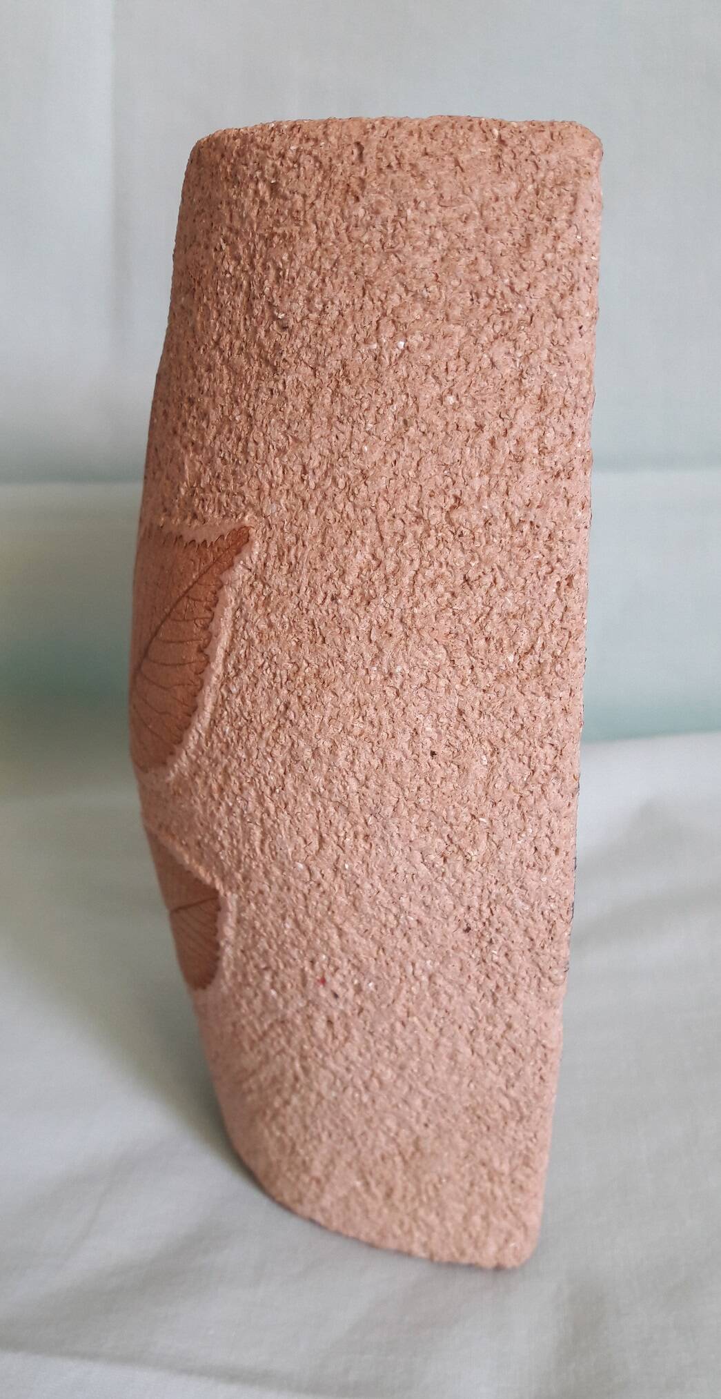 Wall vase in stone