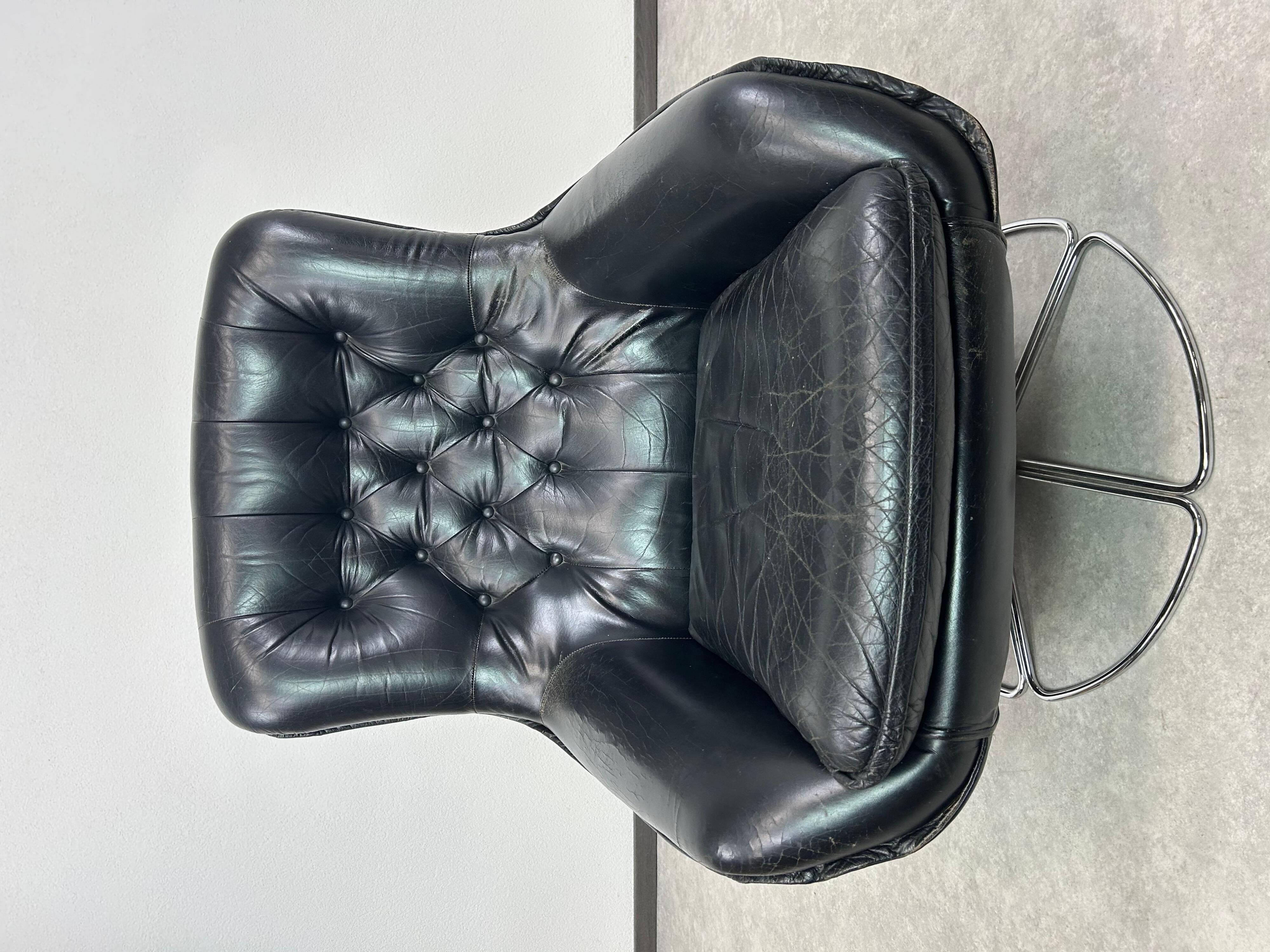 Black leather wingback swivel chair by PeeM