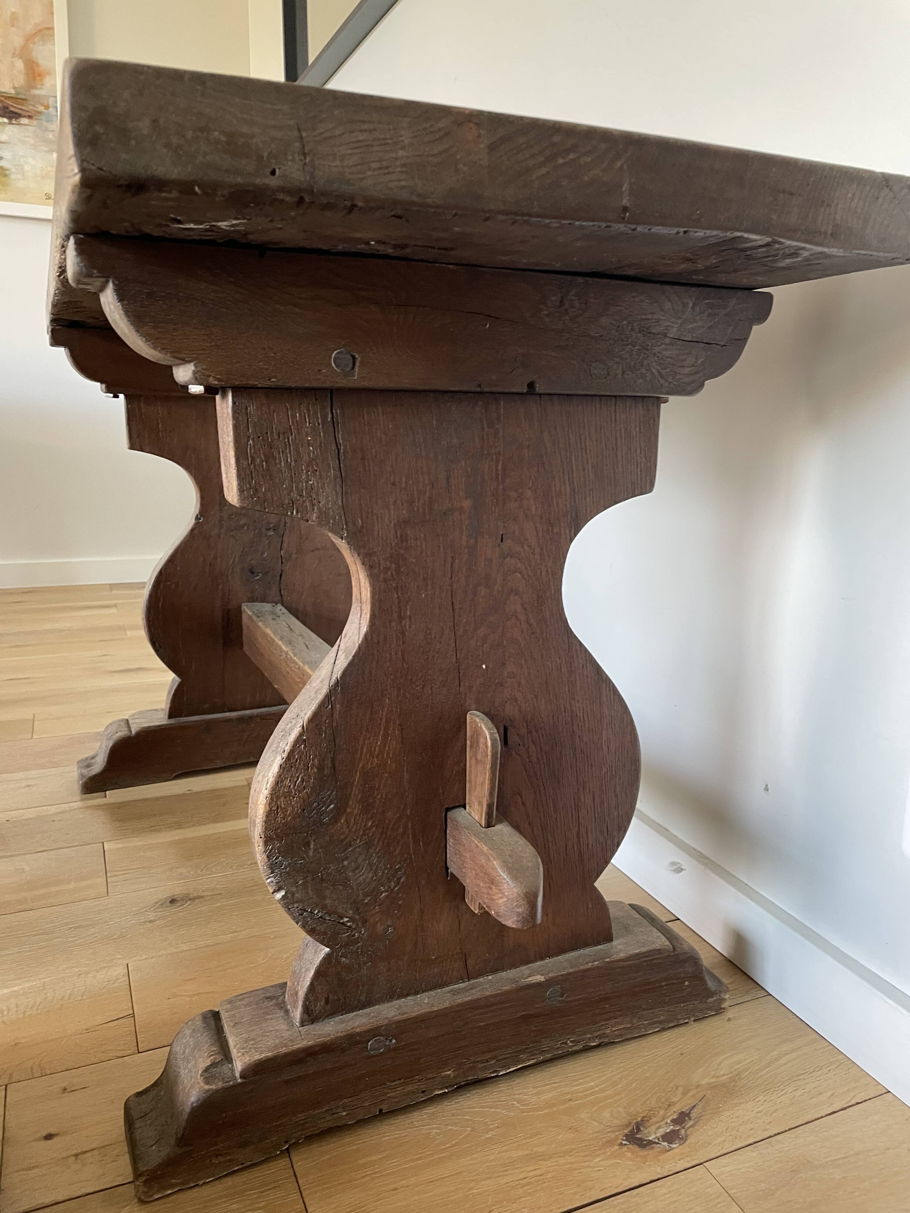 Rustic Spanish table and chair from the late 19th / early 20th century in solid oak.
