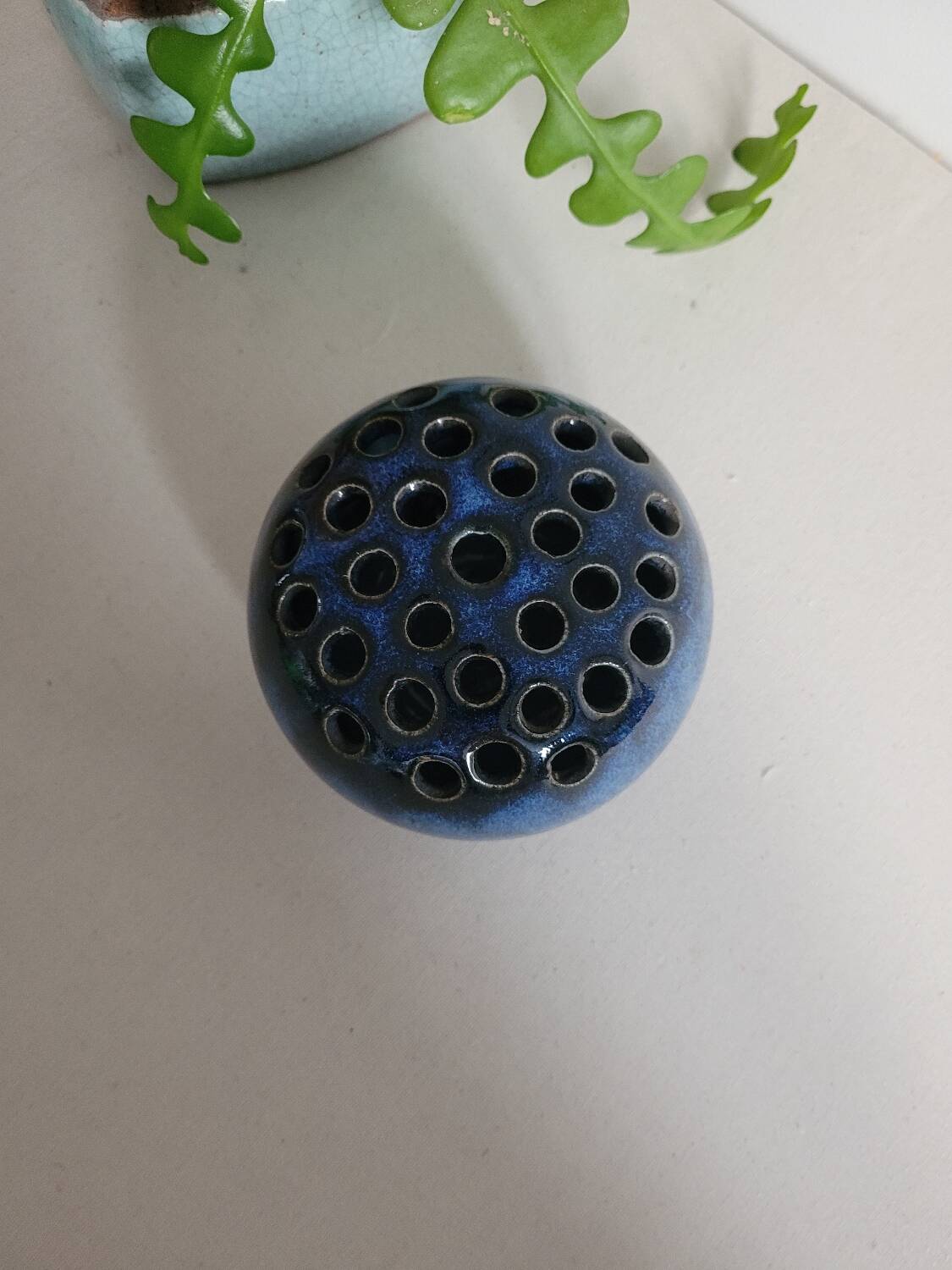 Glazed ceramic flower holder