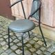 Vintage bistro chair in steel and grey leather from the 1980s.