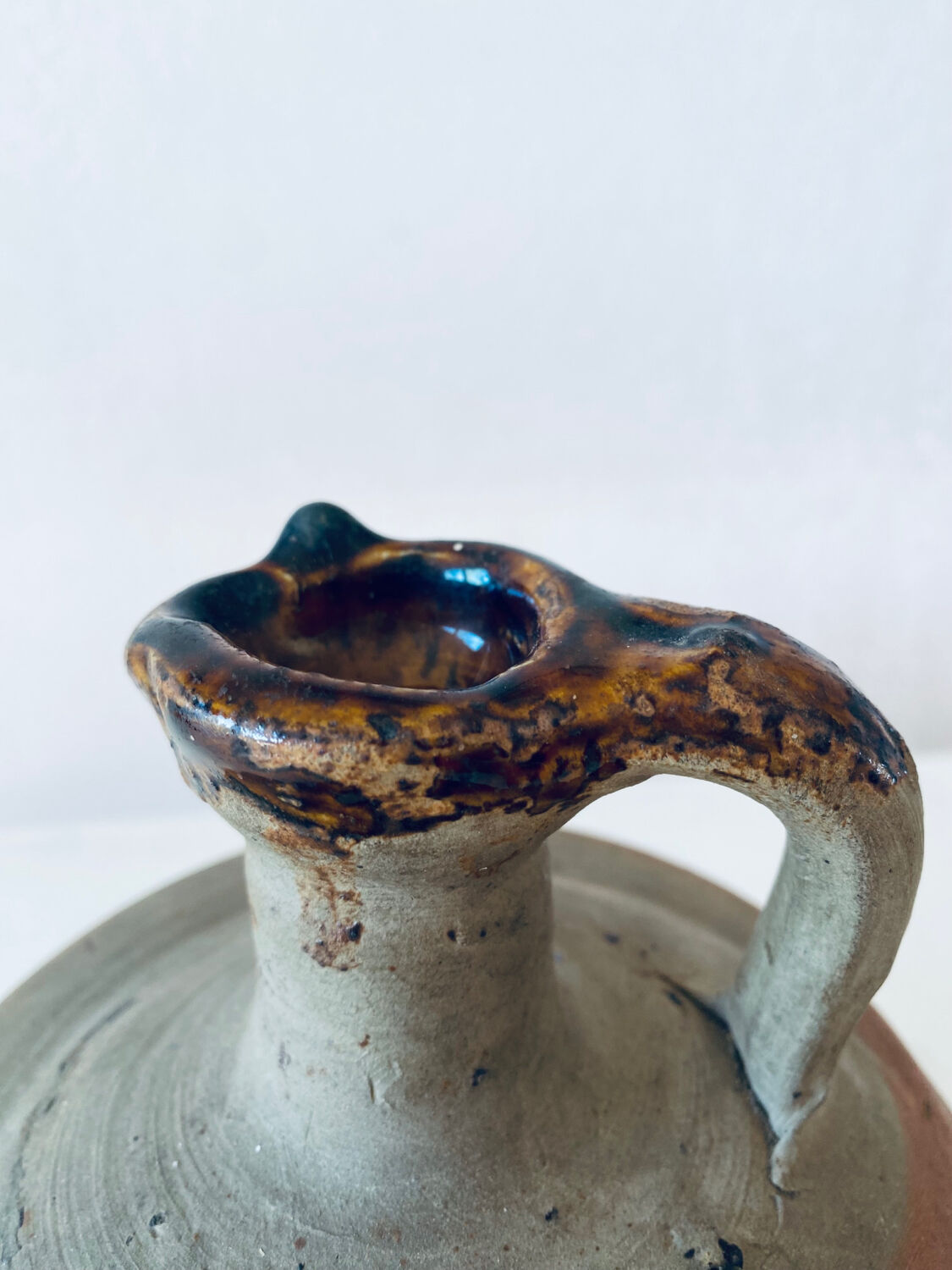 Antique terracotta jug