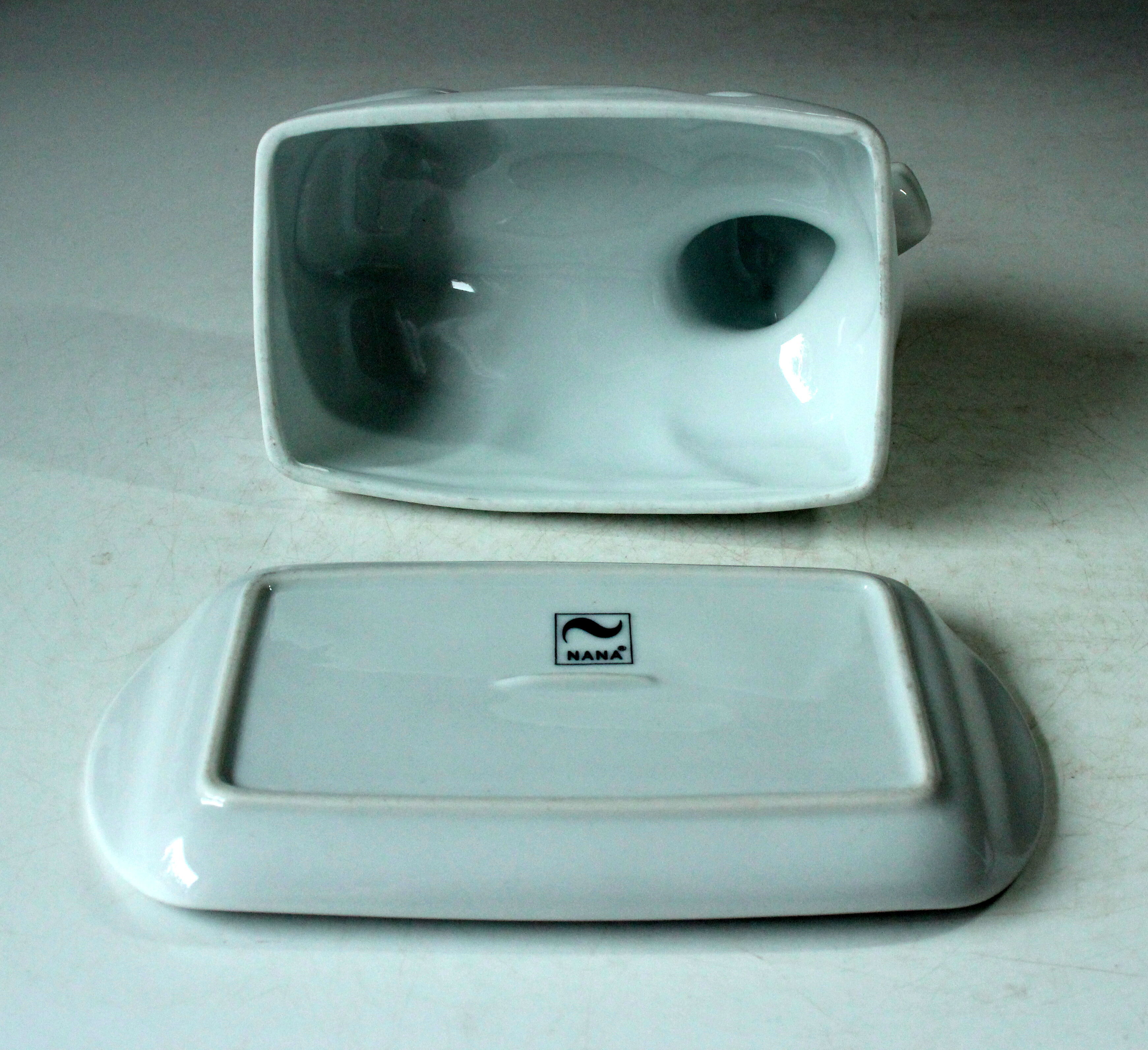 White ceramic butter dish in the shape of a cow, vintage
