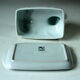 White ceramic butter dish in the shape of a cow, vintage