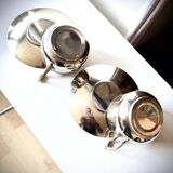 Set of 2 cups with silver-plated saucers, 19th century.