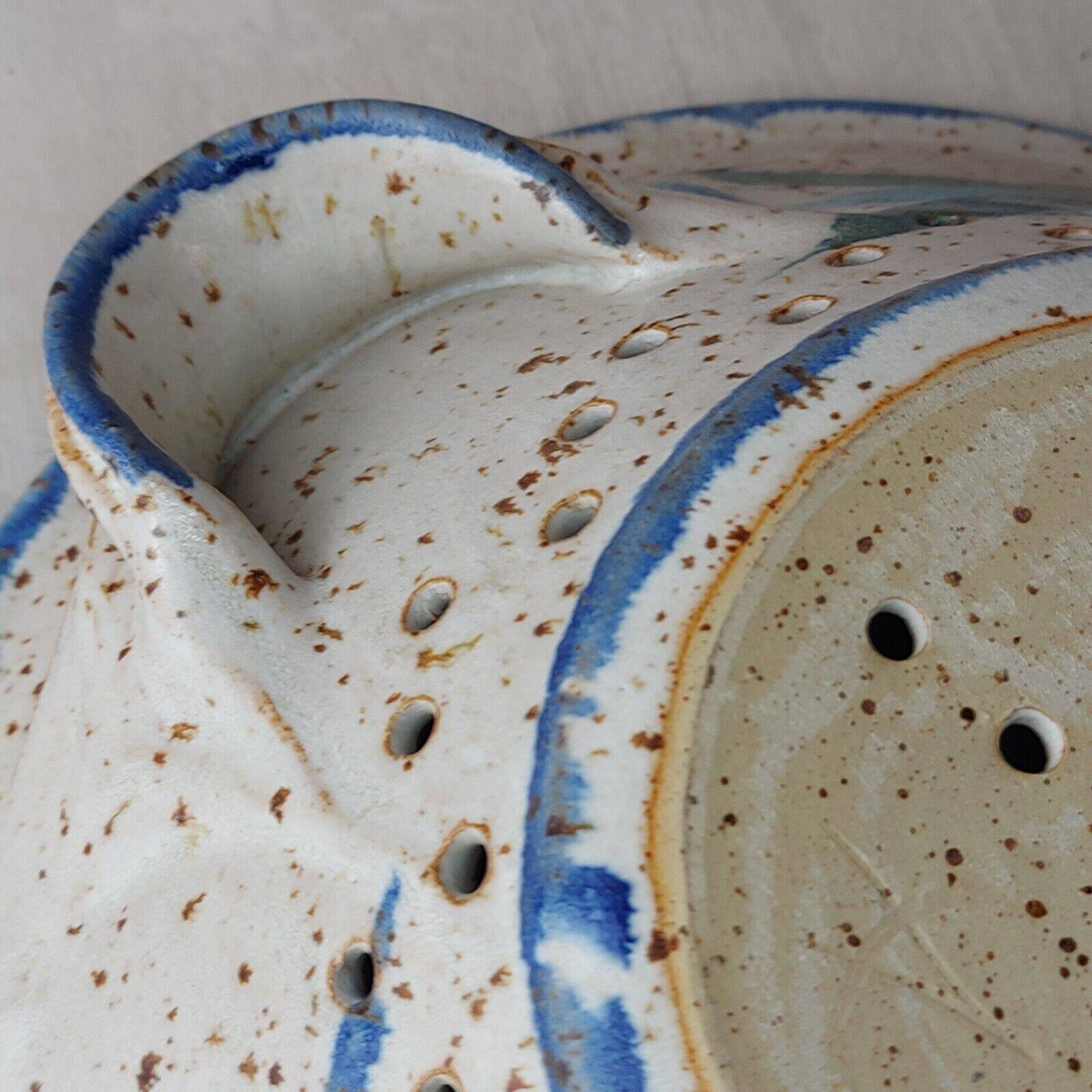 Old stoneware colander