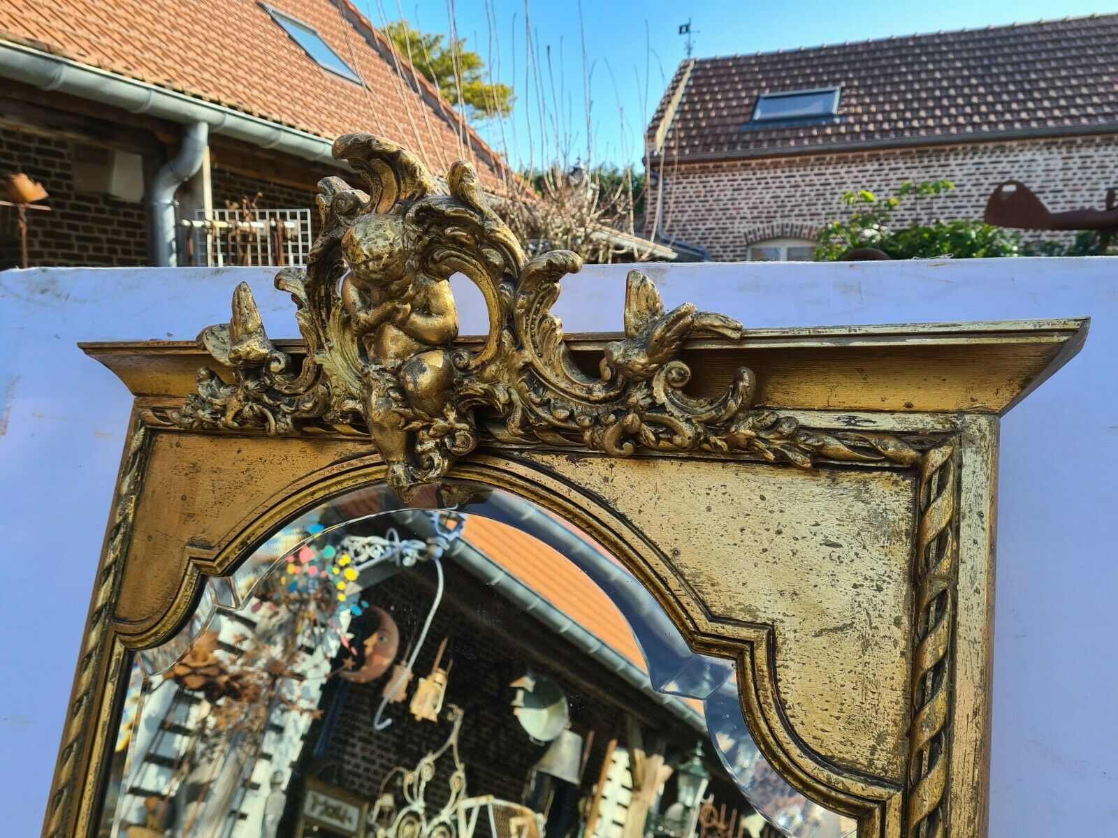 Golden panoramic mirror with an angel  79x174cm