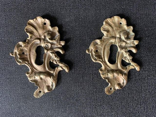 Pair of rocaille bronze keyholes from the 19th century