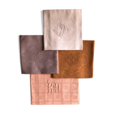 Set of four old damask towels dyed in multiple colors