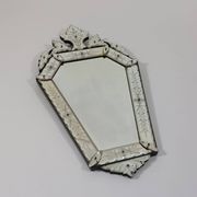 Venetian wall mirror in Murano glass with faceted floral decoration from the 1930s.