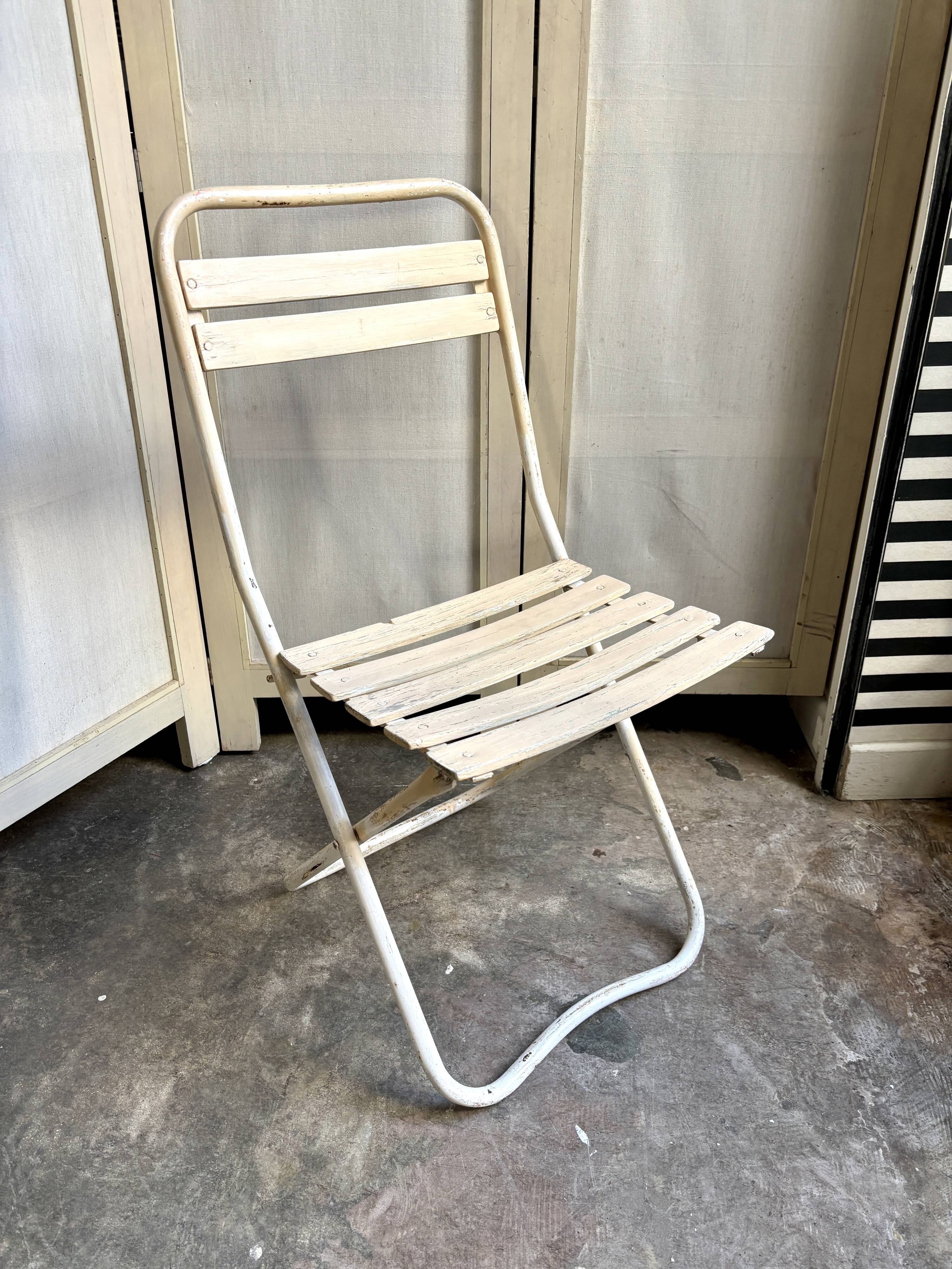 Beige wooden and metal folding chair