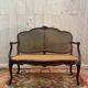 Louis XV mahogany and cane bench
