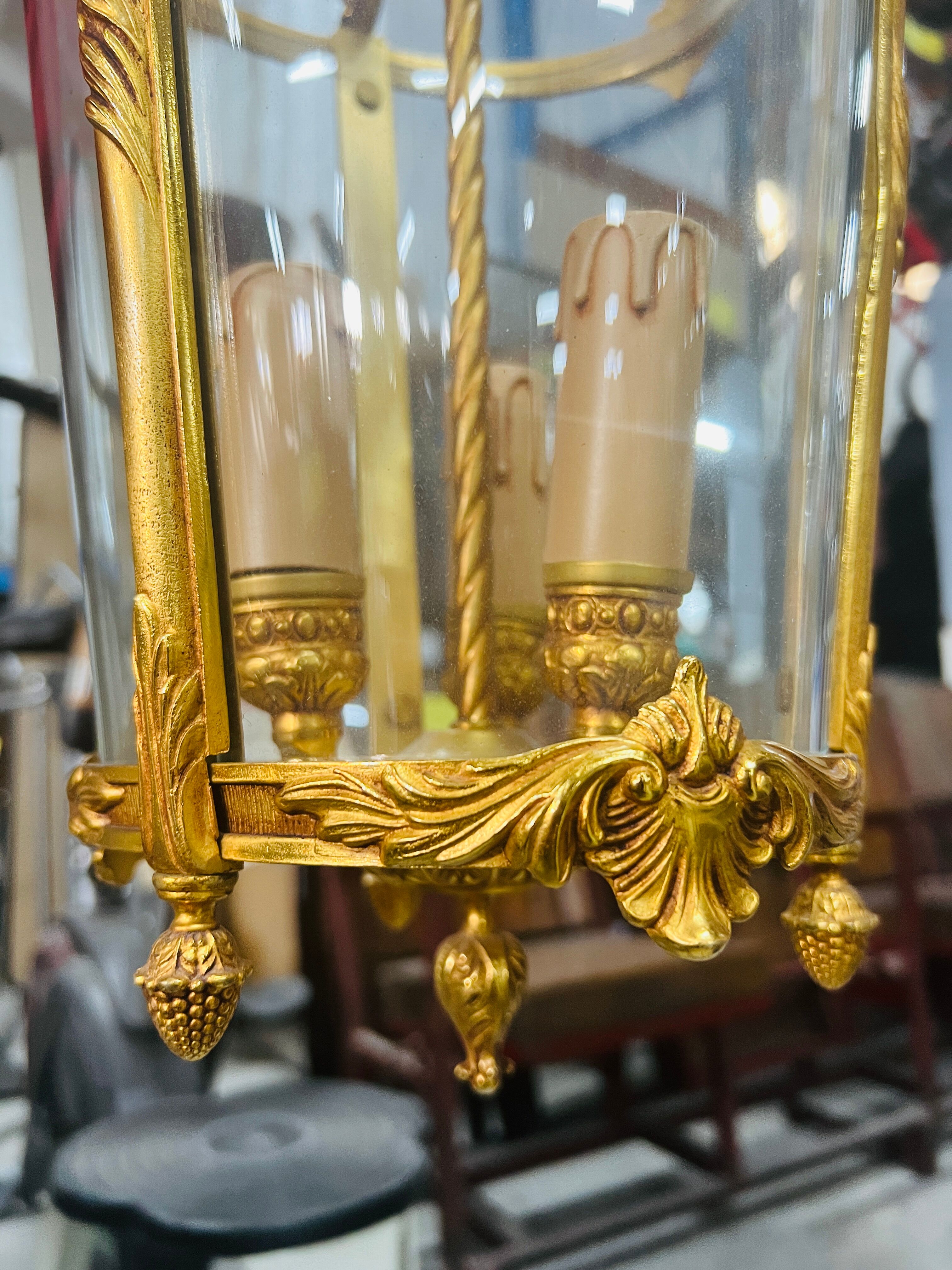 Louis XV style lantern suspension in gilded bronze and glass