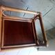 Shelf selette on wooden feet and vintage rattan