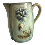 Antique pitcher in thought slip