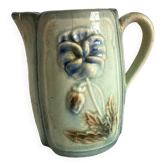 Antique pitcher in thought slip