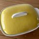 Flat and lid in yellow earthenware from Salins