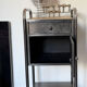 Vintage bedside table in brushed metal