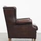 Fauteuil à oreilles de style anglais en cuir de vachette