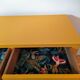 Yellow chest of drawers