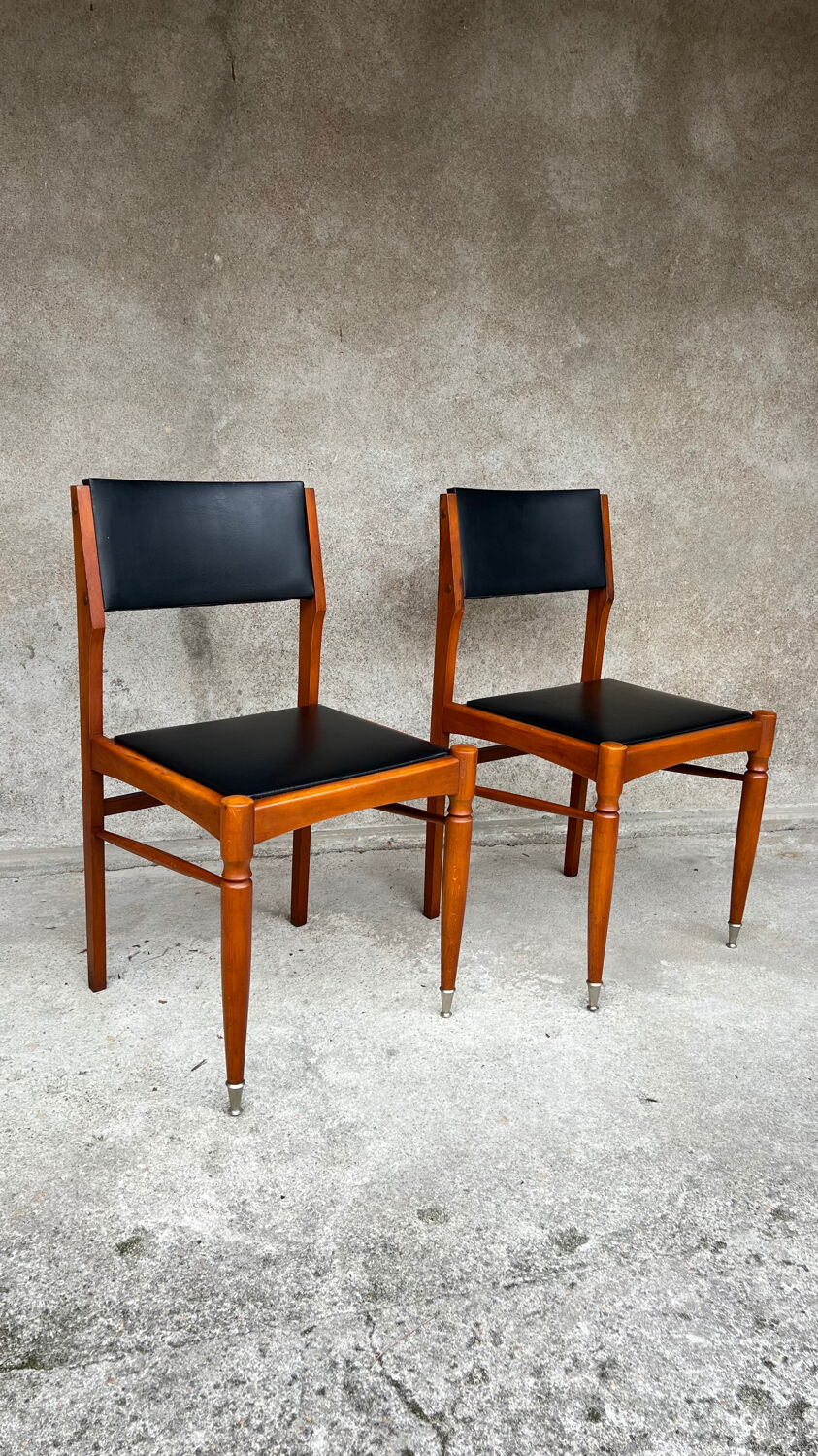 2 wooden and faux leather chairs in Scandinavian style