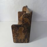 carved wooden shelf