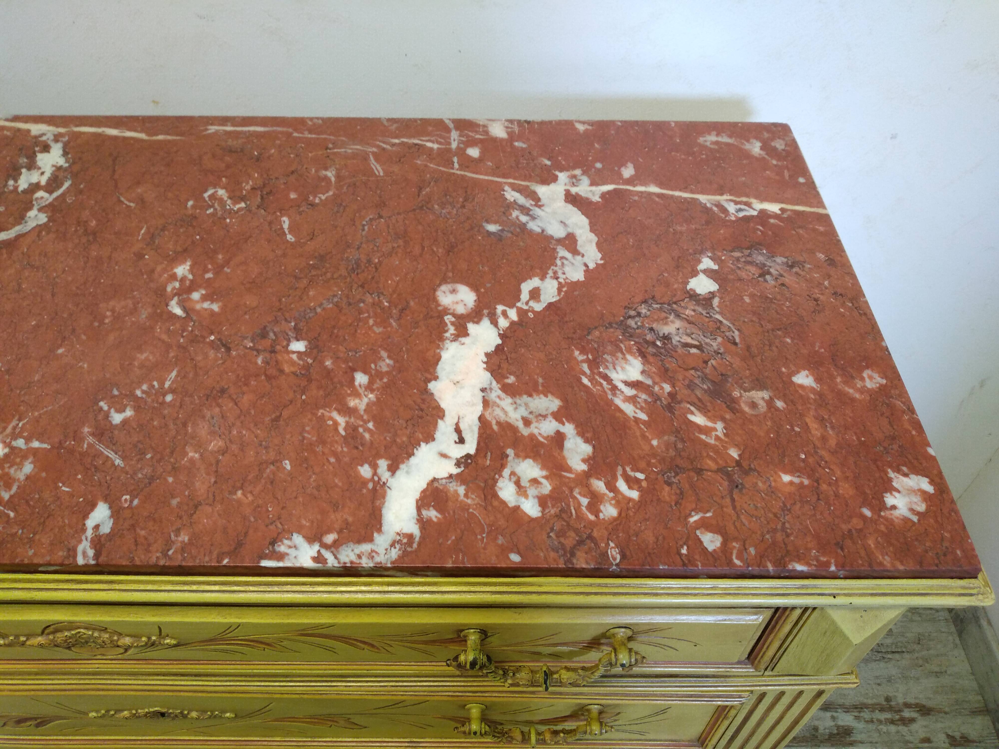 Antique chest of drawers with marble