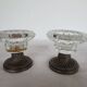 Two candle holders in bronze and crystal