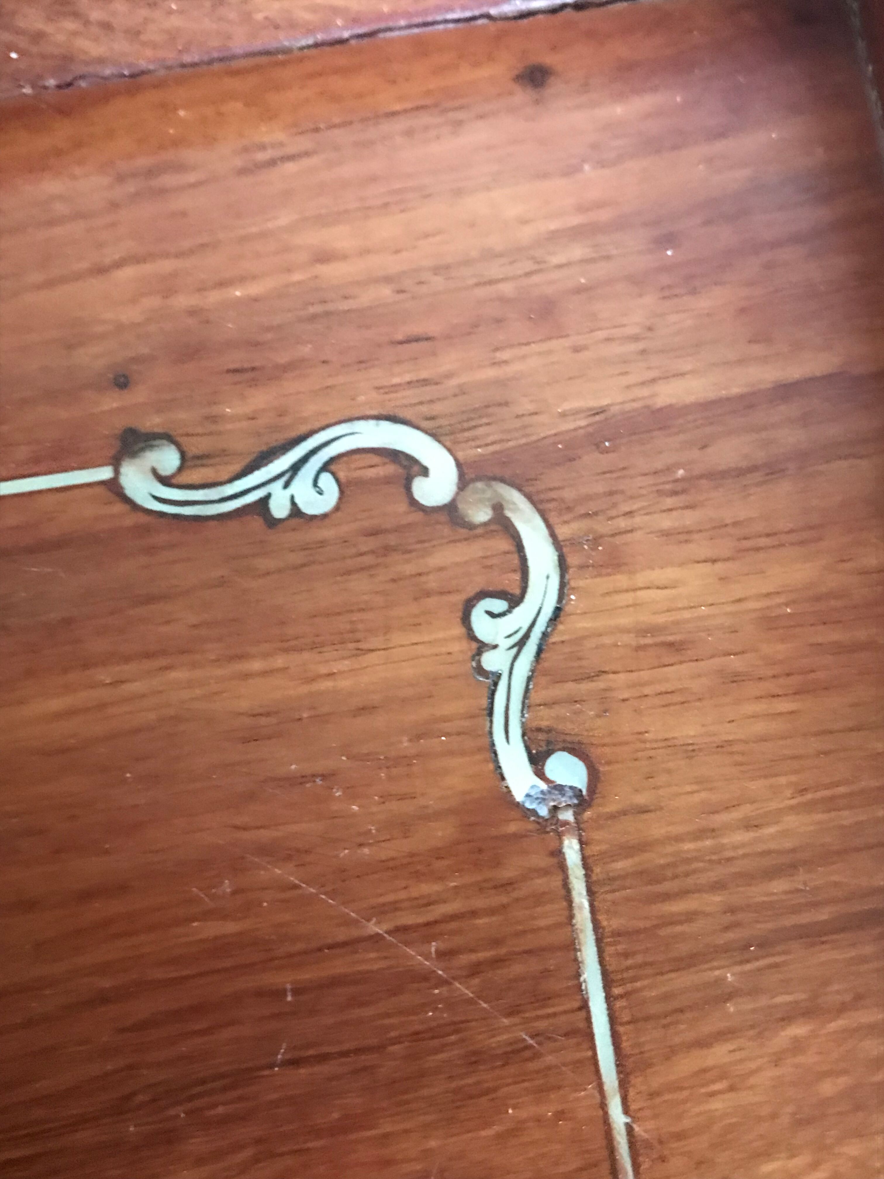 Wood and mother-of-pearl top