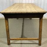 Early 20th-century farmhouse table made of fir, elm, and chestnut.