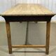 Early 20th-century farmhouse table made of fir, elm, and chestnut.