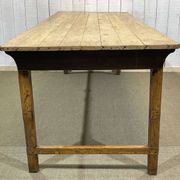 Early 20th-century farmhouse table made of fir, elm, and chestnut.