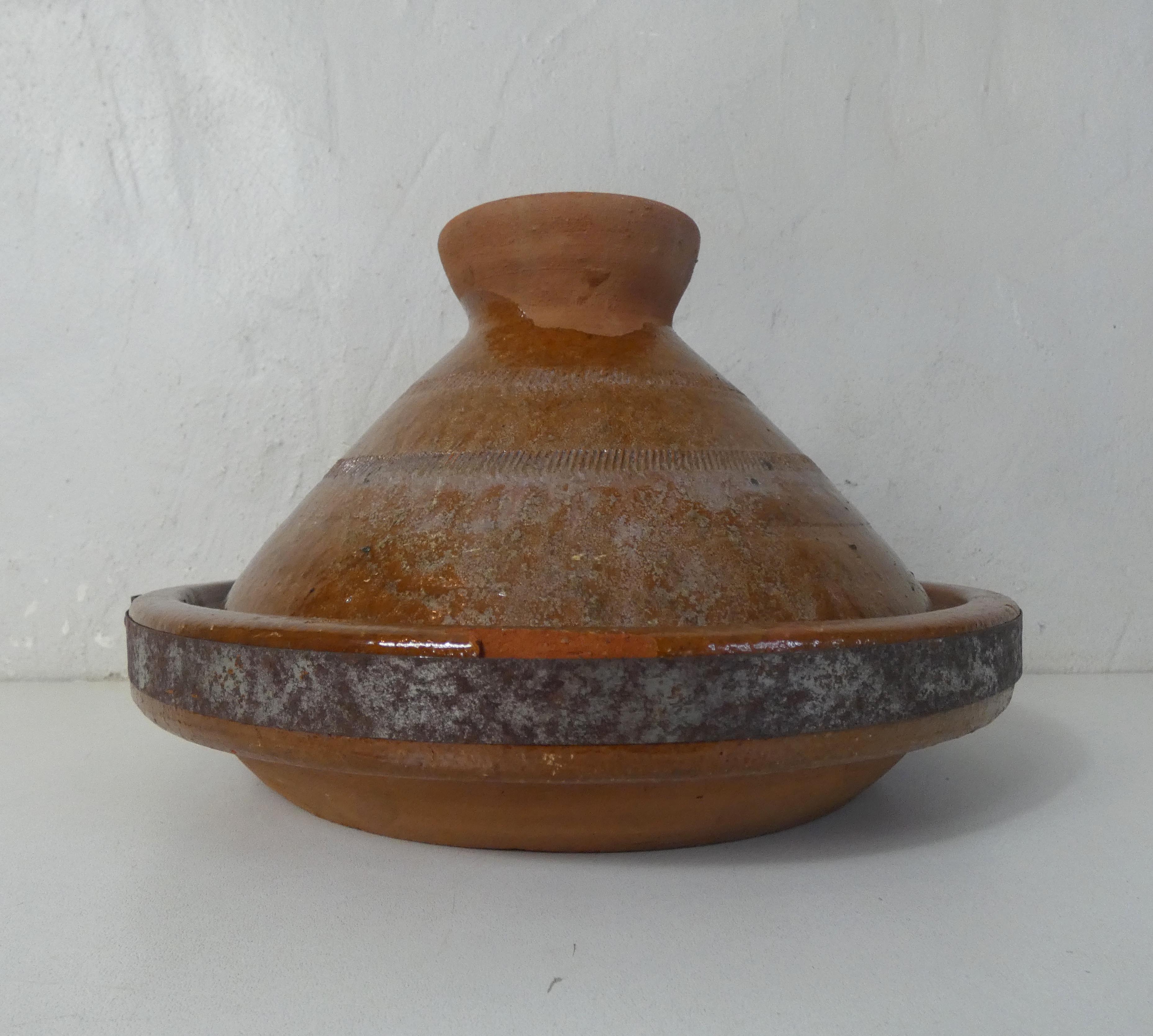 Old glazed terracotta tagine