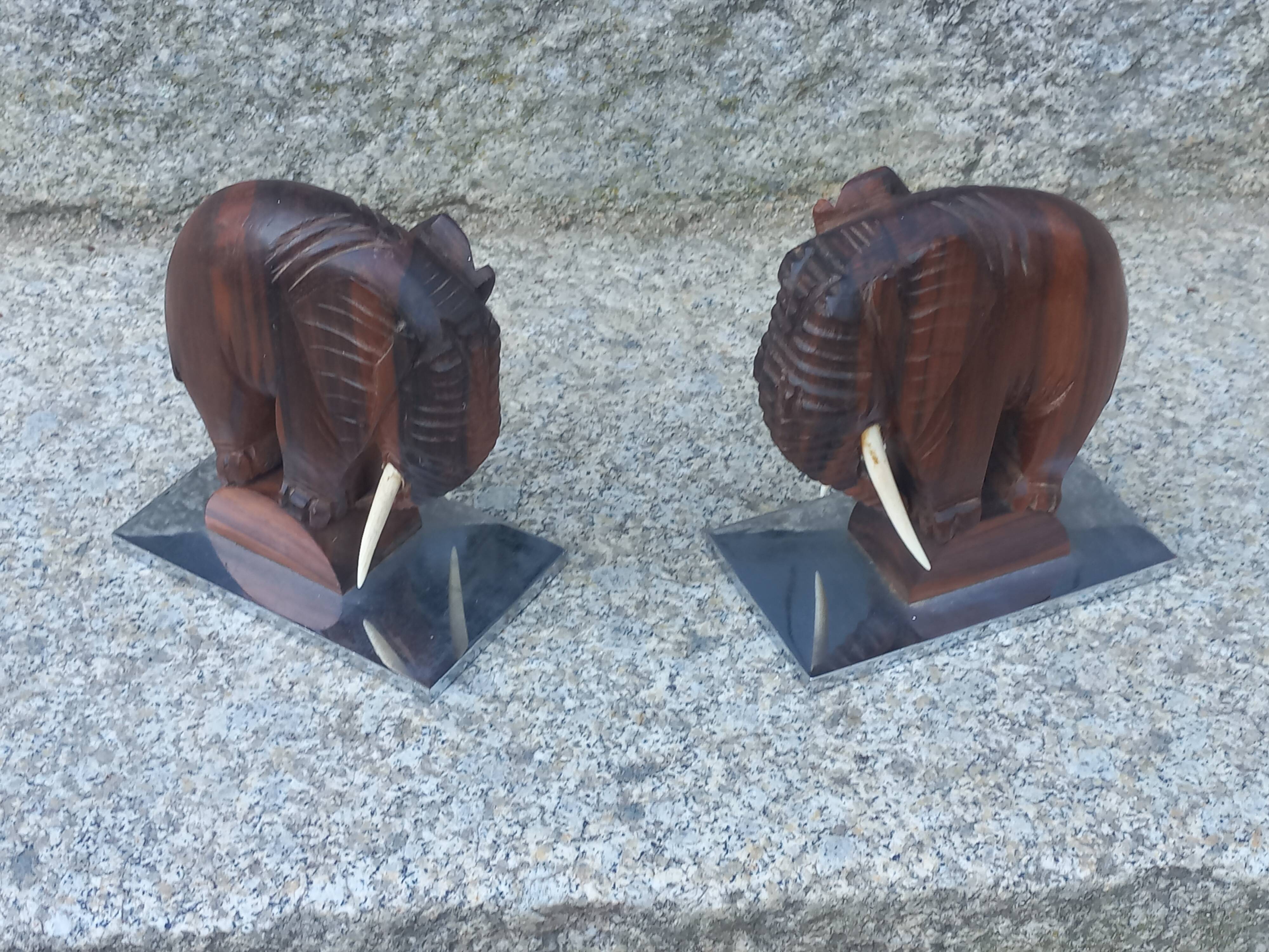 Pair of Art Deco elephant bookends in rosewood with chrome base.