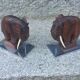 Pair of Art Deco elephant bookends in rosewood with chrome base.