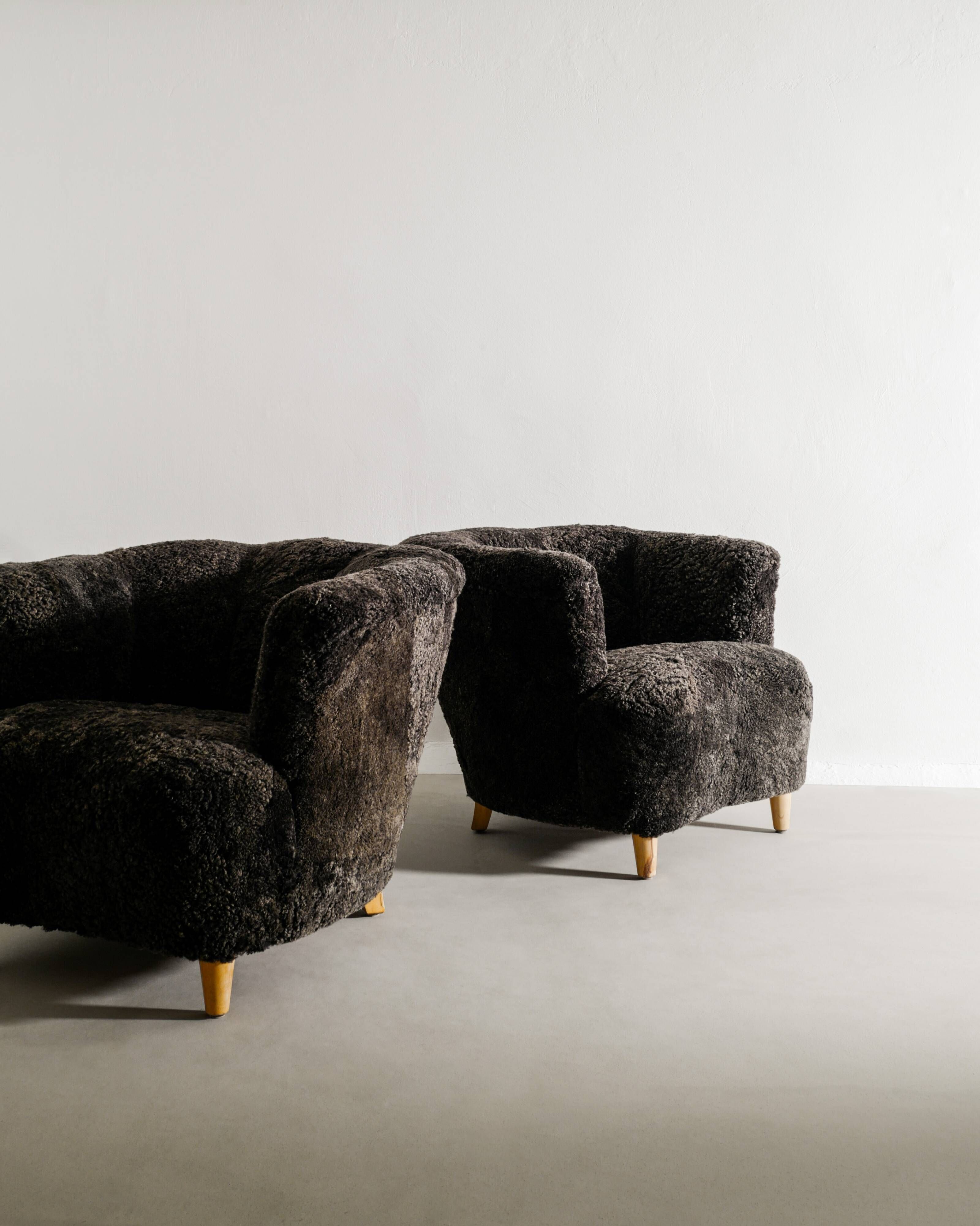 Pair of Swedish Curved Mid Century Modern Armchairs in Dark Sheepskin 1940s