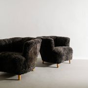 Pair of Swedish Curved Mid Century Modern Armchairs in Dark Sheepskin 1940s
