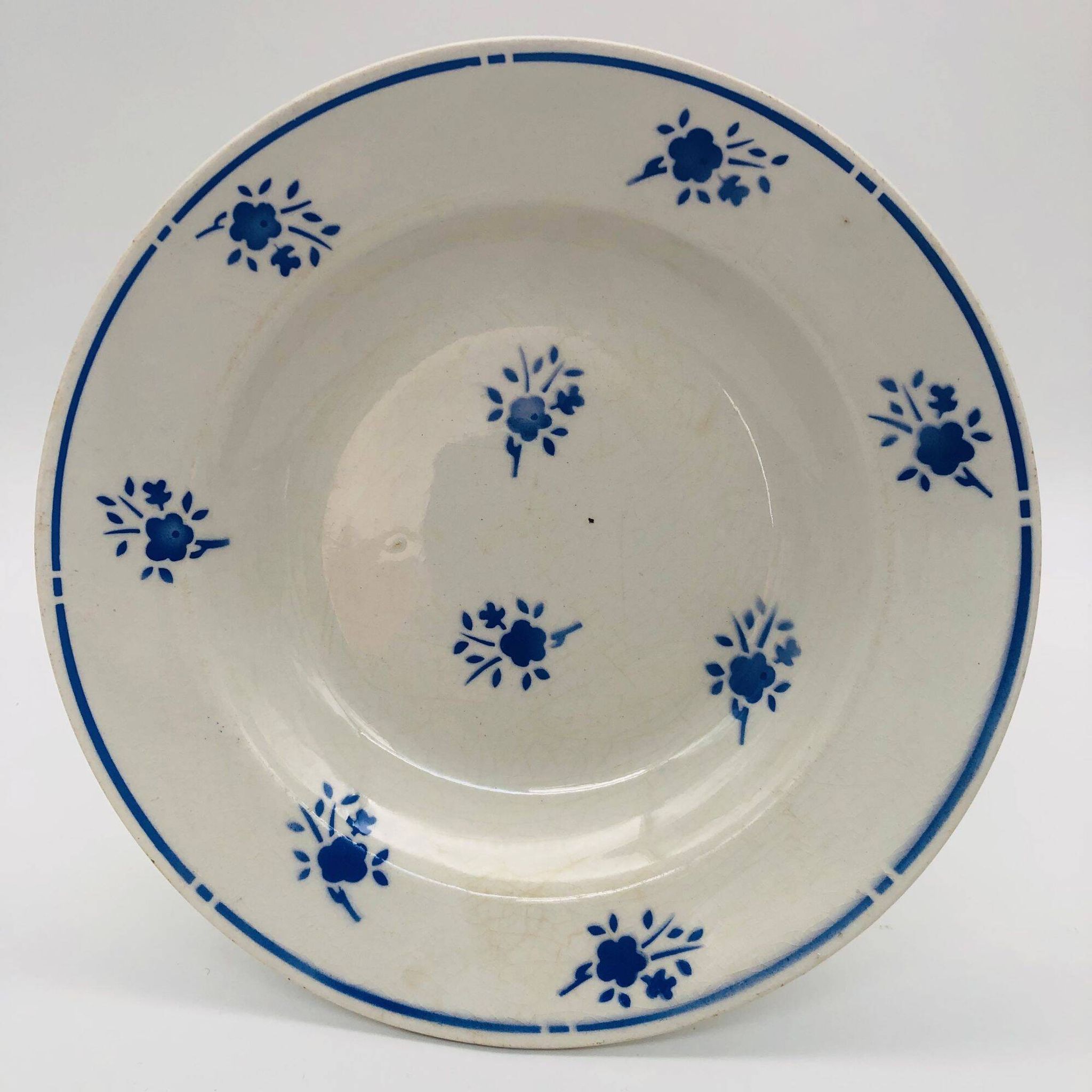 Set of 6 mismatched deep plates.