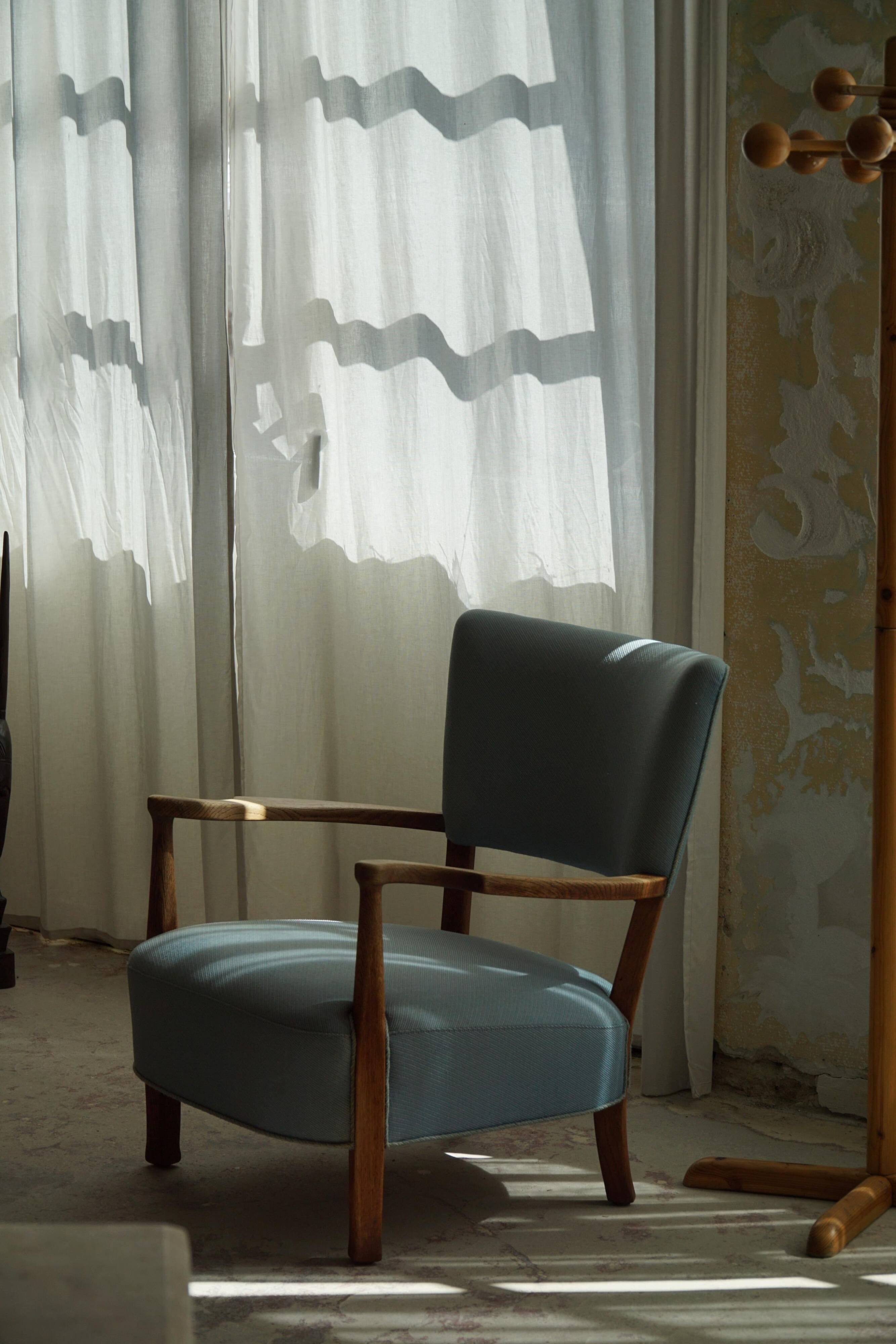 Modern Danish, curved oak chaise longue, attributed to Viggo Boesen, 1950s