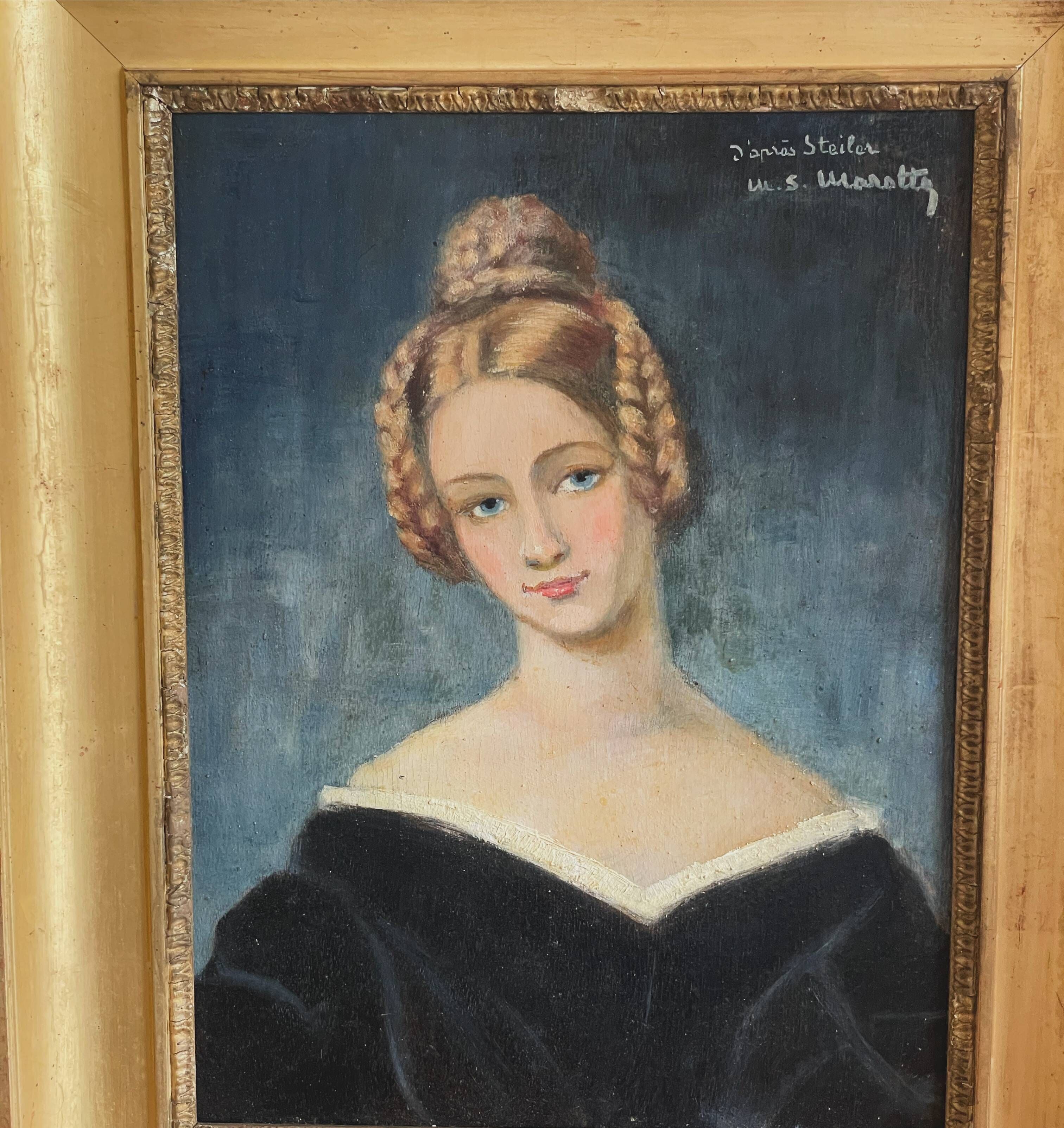 Portrait of young woman painting on wood
